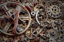 111134702-steampunk-background-machine-parts-large-gears-and-chains-from-machines-and-tractors...jpg